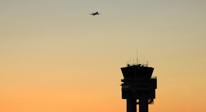 Air Traffic Control Tower and Plane Aeronautical Radio System