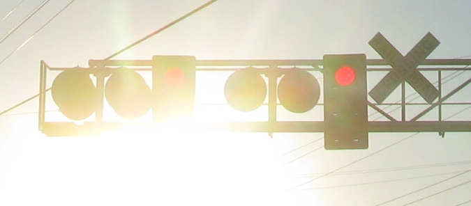 sun glare through railway signals