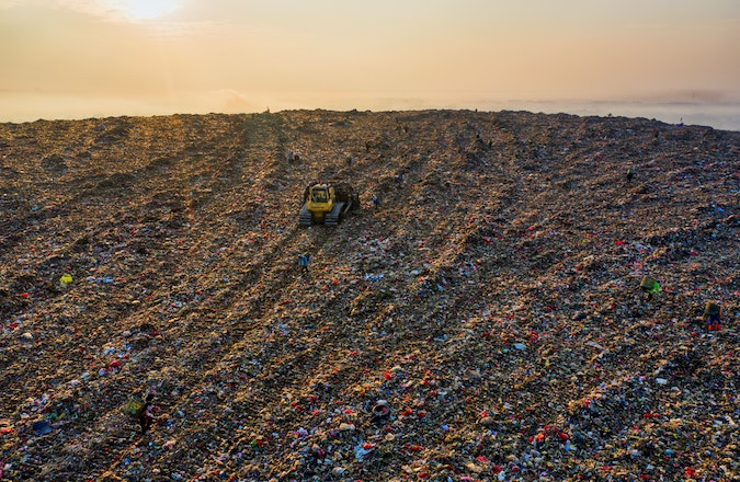 Aerial view of an overflowing landfill site