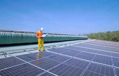 Man installing solar panels