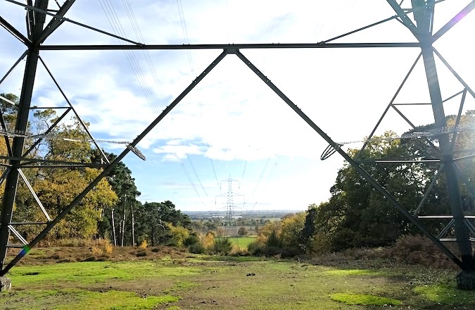 A pylon line in the UK viewed along the cables