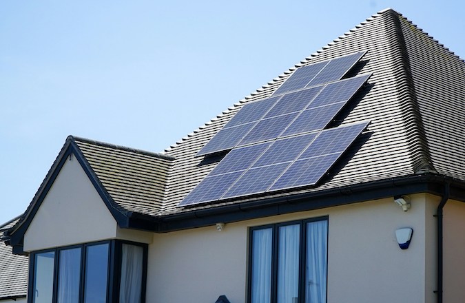 Solar panel systems on a house roof